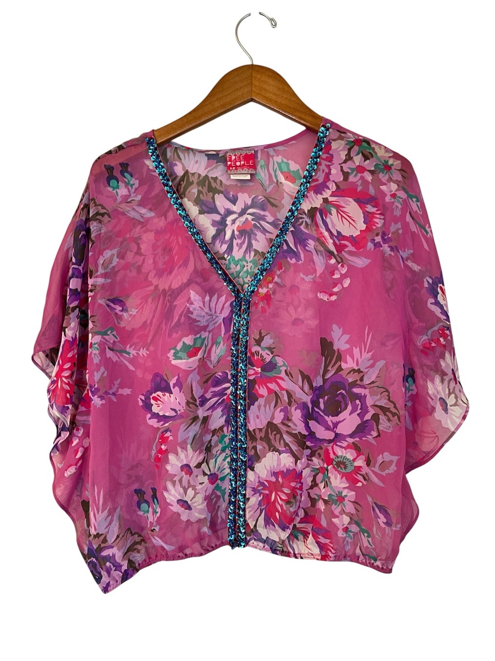 Free People sheer pink floral top  V-neckline adorned with blue sequin size S